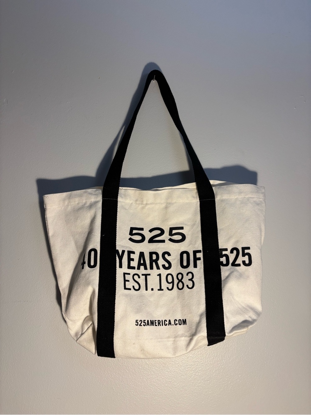 525 America White Canvas Duffel Tote with Black Straps and Bold Logo